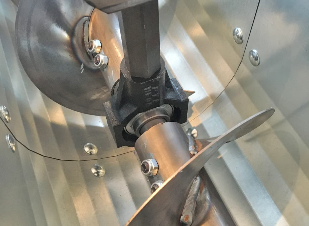 Skruvtransportör inuti röret